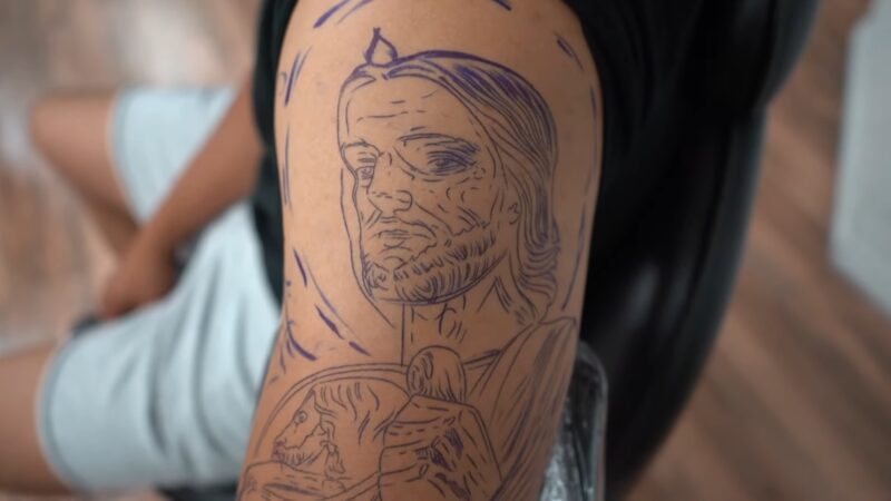 tattoo San Judas Tadeo in a boat