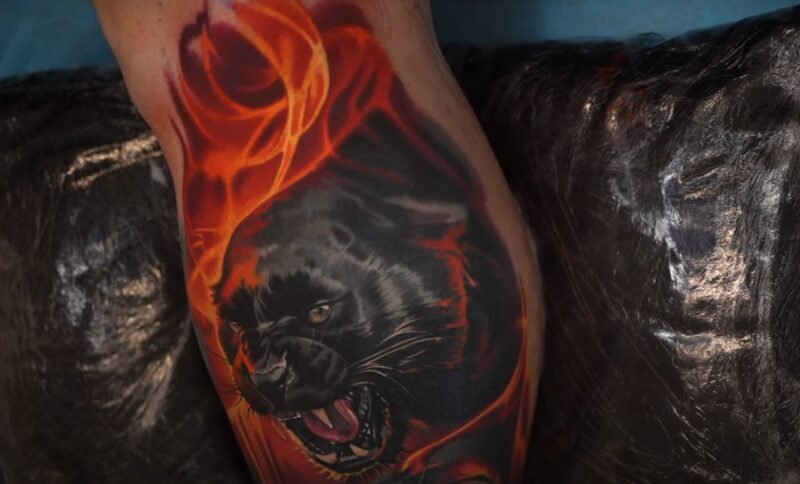 Golden flame tattoo